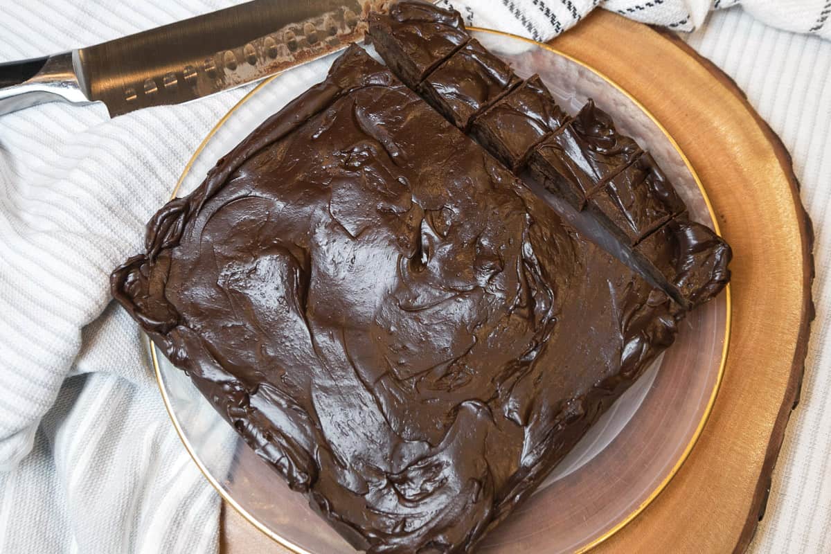 Dark chocolate fudge on a plate.
