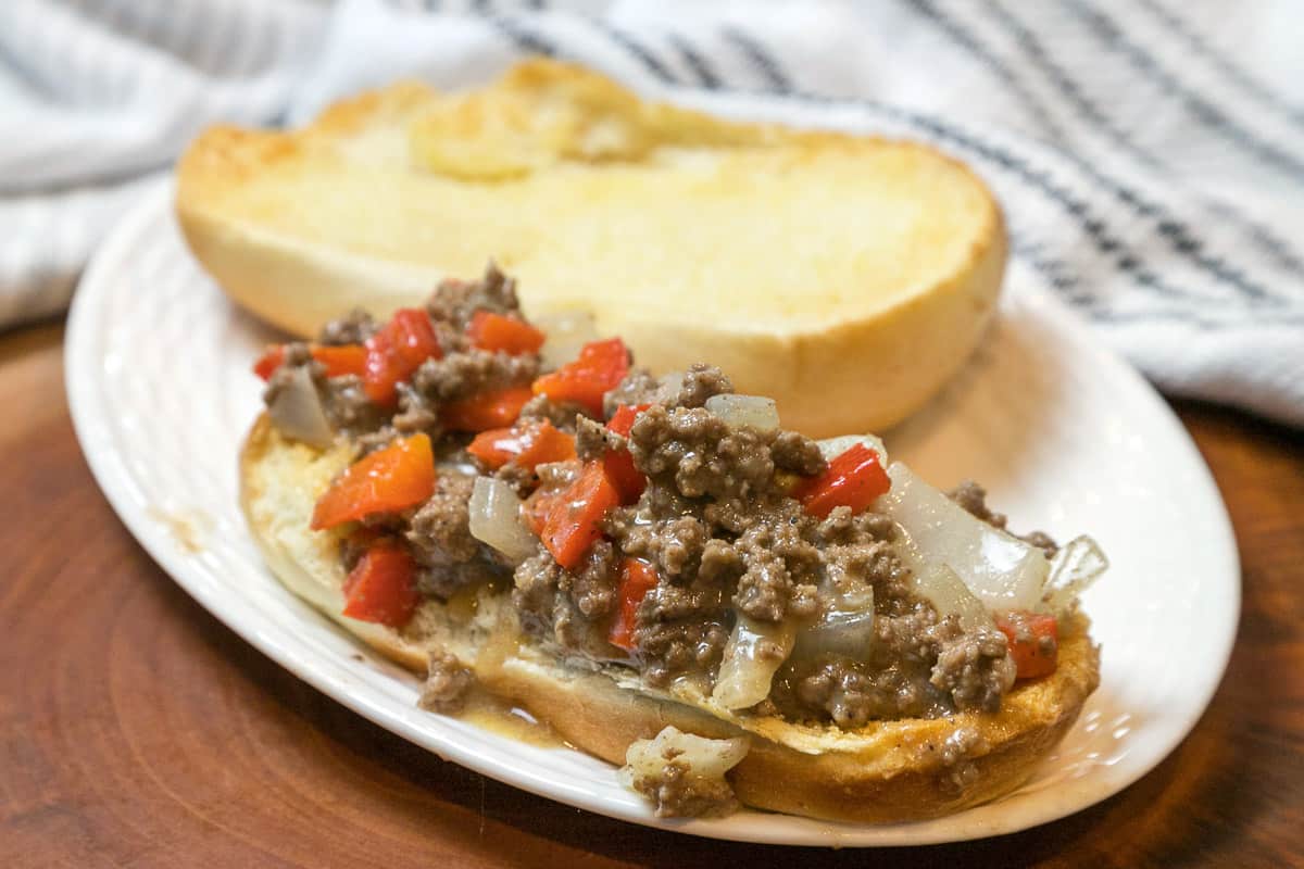 Ground beef Philly cheesesteak sandwich.