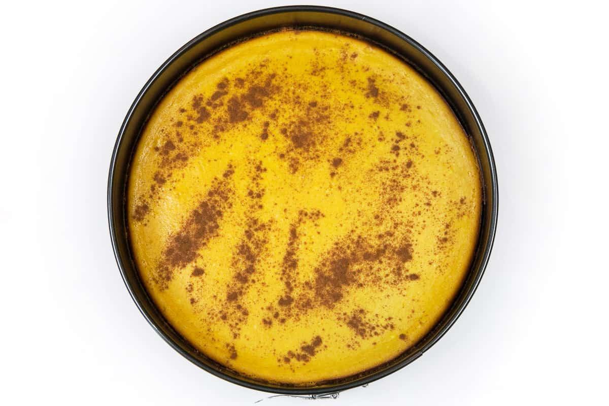 Pumpkin cheesecake baked at three hundred and fifty degrees Fahrenheit for thirty-five to forty minutes.
